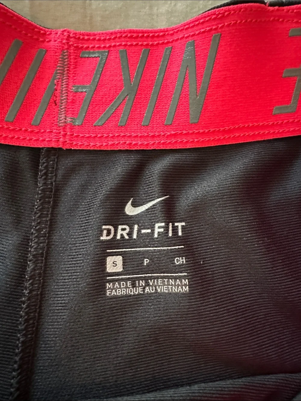 Nike Black Women's Athletic Shorts with Pink Trim